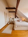 Stylový podkrovní byt 2+kk s výhledem na Vítkov Karlín, cena 23000 CZK / objekt / měsíc, nabízí CENTURY 21 Harmony