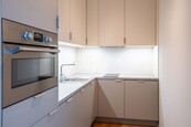 Pronájem luxusního bytu 1+KK v novostavbě v Kobylisích, ul. Pakoměřická., cena 19500 CZK / objekt / měsíc, nabízí RK Group realitní kancelář